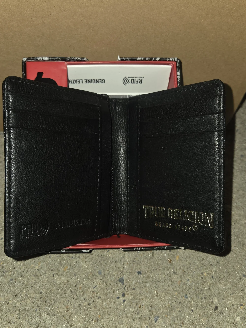 True Religion Black Textured Leather Bifold Wallet with Gold Logo